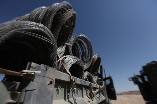 Barbed wire, lumber, generators and other items will be used by elements of Combat Logistics Company, Combat Logistics Battalion 6, to establish patrol bases throughout the Upper Sangin Valley in Helmand province, Afghanistan. The bases will be utilized by members of the 1st Battalion, 6th Marine Regiment as they conduct combat operations in the region. (U.S. Marine Corps photo by Sgt. Justin J. Shemanski)