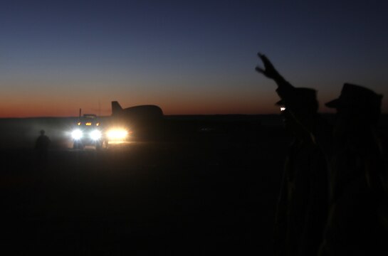 Marines with Combat Logistics Company, Combat Logistics Battalion 6, wave goodbye to fellow troops as they leave Forward Operating Base Nolay, Afghanistan, Oct. 16. The Marines will spend approximately the next two weeks supporting elements of the 1st Battalion, 6th Marine Regiment, by establishing patrol bases. (U.S. Marine Corps photo by Sgt. Justin J. Shemanski)