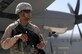 Airman 1st Class Dominique Maniece, 455th Expeditionary Security Forces Squadron Fly Away Security Team member, provides security for a C-130J Hercules aircraft, Sept. 9, 2011, at Bagram Airfield, Afghanistan. Maniece is stationed at Altus Air Force Base, Okla. (U.S. Air Force photo/Senior Airman Krista Rose)
