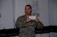 Senior Airman Joseph Rossilli, 379th Expeditionary Medical Group, describes the items that should be in every individual first aid kit during a mass IFAK rebuild, Aug. 24, 2011, at an undisclosed location in Southwest Asia. The 379th Air Expeditionary Wing is responsible for the certification and distribution of all IFAKS throughout the Area of Responsibility. (U.S. Air Force photo/Senior Airman Eric Summers Jr.)