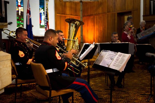 The brass quartet of the U.S. Marine Corps Forces, Pacific Band plays at the 9/11 memorial service held at the St. Andrew's on Liardet Church here Sept. 11. The American Ambassador to New Zealand, David Huebner, and the American rugby team, the Eagles were present at the memorial.