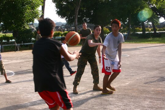 Children from the Bahay Ni Nanay Orphanage visited U.S. Marines and sailors April 21, 2012 on Antonio Bautista Air Base, Puerto Princesa, Palawan, Republic of the Philippines.