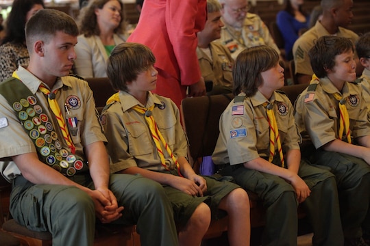 Members of Camp Pendleton's Boy Scout Troop 790 sit front-row at a Court of Honor ceremony, April 24. Prior to the ceremony, Eagle Scout Connor F. Stotts was presented the coveted Boy Scouts of America 'Honor Medal with crossed palms'. Stotts was awarded the medal in recognition for single handedly saving the lives of three swimmers, July 31, 2011.