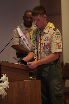 Connor F. Stotts, an Eagle Scout with Camp Pendleton's Boy Scout Troop 790 gives thanks to friends and family after accepting the 'Honor Medal with crossed palms'. Stotts was presented the coveted Boy Scouts of America 'Honor Medal with crossed palms'. Stotts was awarded the medal in recognition for single handedly saving the lives of three swimmers, July 31, 2011.