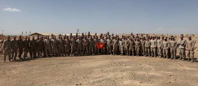 Marines and sailors with 2nd Explosive Ordnance Disposal Company, 1st Marine Logistics Group (Forward) take a group photo on the EOD compound at Camp Leatherneck, Afghanistan April 24. The Marines and sailors are wrapping up a six month deployment to Helmand Province, Afghanistan. During their tour, the company completed more than 2,800 total responses, responded to 740 IED calls and neutralized over 1,000 IEDs. Additionally, the company turned in more than 1,500 bags of evidence for further exploitation and trained nearly 10,000 personnel.