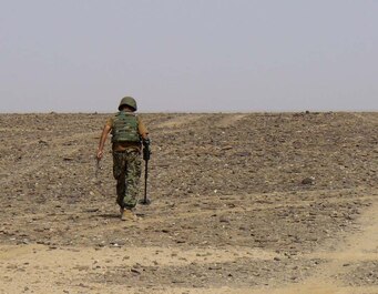 Afghan National Army Sgt. Nizamuddin Azizi, explosive ordnance disposal technician, Route Clearance Tolay, 4th Kandak, 2nd Brigade, 215th Corps, searches for an improvised explosive device in Helmand province, Afghanistan, Aug. 1, 2012. In the past month, EOD teams with 2nd Brigade have independently neutralized more than 30 IEDs.