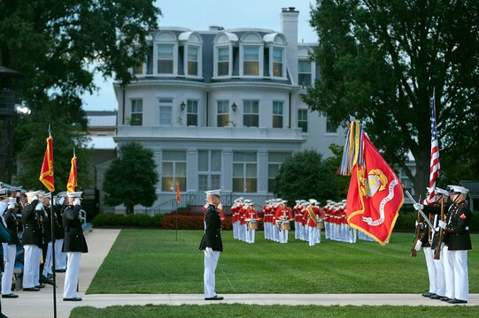 The Marine Corps Color Guard dips the battle color of the Marine Corps as the national anthem plays during a ceremony for the Brigadier General Select Orientation Course Aug. 20.