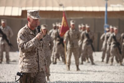 Lt. Col. Christian Richardson, commanding officer, 1st Maintenance Battalion (-) Reinforced, 1st Marine Logistics Group (Forward) speaks to members and guests during a color casing ceremony at Camp Leatherneck, Afghanistan, Aug. 23. "Being able to take on this challenging mission of providing tactical logistics support throughout the battle space has been absolutely tremendous," said Richardson.
