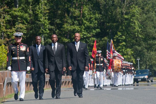 Sgt. Maj. Micheal P. Barrett, sergeant major of the Marine Corps, Carlton Kent, John Estrada and Alford McMichael, the 16th, 15th, and 14th sergeants major of the Marine Corps, and a funeral escort composed of Marine Barracks Washington Marines, march during the procession for the funeral of Henry H. Black, seventh sergeant major of the Marine Corps, at Marine Corps Base Quantico, Va., Aug. 29. Black passed away in his home in Fredericksburg, Va., Aug. 24. He served in Korea and Vietnam and earned a Silver Star, Bronze Star, Purple Heart, and Combat Action Ribbon.