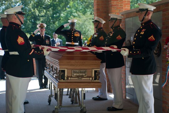 U.S. Marine Corps body bearers prepare to the fold the flag that laid over the casket of Henry H. Black, seventh sergeant major of the Marine Corps, during his funeral ceremony at Marine Corps Base Quantico, Va., Aug. 29. Black passed away in his home in Fredericksburg, Va., Aug. 24. He served in Korea and Vietnam and earned a Silver Star, Bronze Star, Purple Heart, and Combat Action Ribbon.