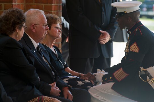 Sgt. Maj. Eric J. Stockton, Marine Barracks Washington sergeant major, consoles Mrs. Fannie Black, wife of Henry H. Black, seventh sergeant major of the Marine Corps, during Black’s funeral ceremony at Marine Corps Base Quantico, Va., Aug. 29. Black passed away in his home in Fredericksburg, Va., Aug. 24. He served in Korea and Vietnam and earned a Silver Star, Bronze Star, Purple Heart, and Combat Action Ribbon.