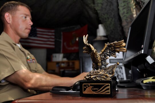 Maj. Stephen F. Wildt, the Combined Federal Campaign action officer for Marine Corps Base Camp Pendleton, completes work at his desk in preparation for this year's charity campaign. The CFC, established in 1961 by Pres. John F. Kennedy, is an annual workplace charity campaign that provides federal and military employees with an opportunity to donate to local, national and international organizations.