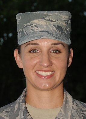 Senior Airman <b>Erin Carpenter</b> smiles for a photo during technical training at ... - 110921-F-BD983-030