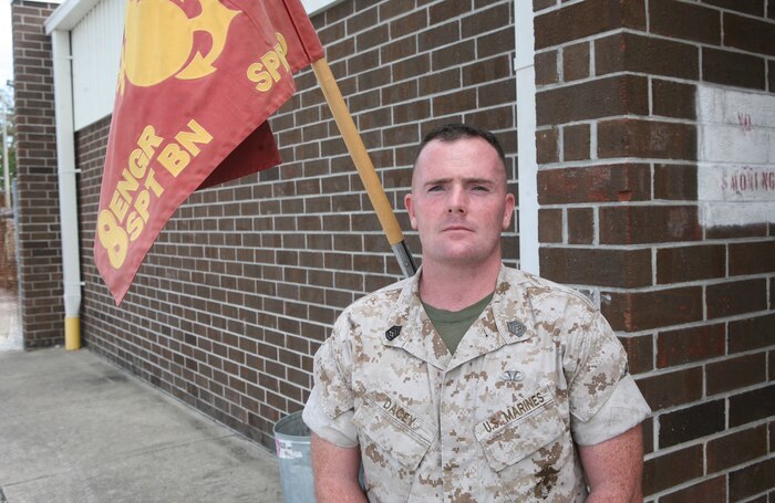 Gunnery Sgt. James J. Dacey, company gunnery sergeant for Support Company, 8th Engineer Support Battalion, 2nd Marine Logistics Group, poses for a photo aboard Camp Lejeune, N.C., September 28, 2011. Beginning October 22, 2011, Dacey will commence on a 345-mile run from Camp Lejeune to the National Naval Medical Center, Bethesda, Md., in honor of wounded warriors. (U.S. Marine Corps photo by Pfc. Franklin E. Mercado)