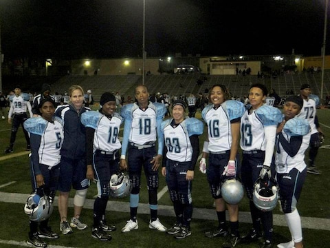 Lt. Kristin Love, number 19 and division officer of the Patient Administration Department, Naval Hospital, Marine Corps Base Camp Pendleton, poses with fellow team-mates of San Diego Surge. San Diego Surge is one of 62 teams of the Women’s Football Alliance. Photo by Tracy Wong.