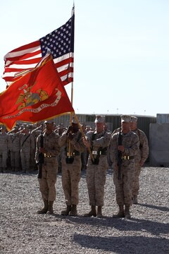 The Combat Logistics Battalion 5, 1st Marine Logistics Group (Forward) color guard presents their battle colors during a casing of the colors ceremony at Camp Dwyer, Afghanistan, July 30. Since their arrival in April, Marines and sailors with CLB-5 conducted daily combat logistics patrols to multiple forward operating bases, patrol bases and combat outposts.