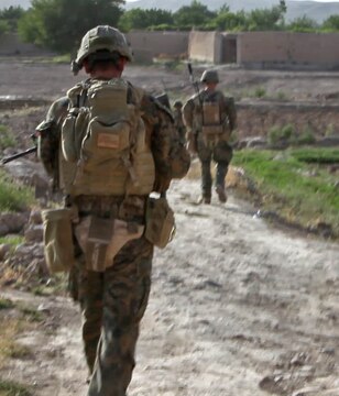 Staff Sgt. Edward Marini, an Explosive Ordnance Disposal Technician and team leader with 1st EOD Company, 1st Marine Logistics Group (Forward), patrols through the Sangin District in Helmand Province, Afghanistan, June 12. Marini’s team responded to an unexploded ordnance call in support of Baker Company, 1st Battalion, 7th Marines.