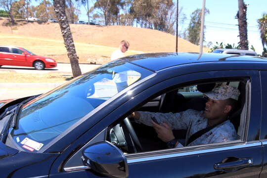Texting and driving not only takes the drivers' hands off the steering wheel, but also distracts the driver from keeping their eyes on the road. This is against the law and puts the driver and everyone around them in danger. (Photo illustration)