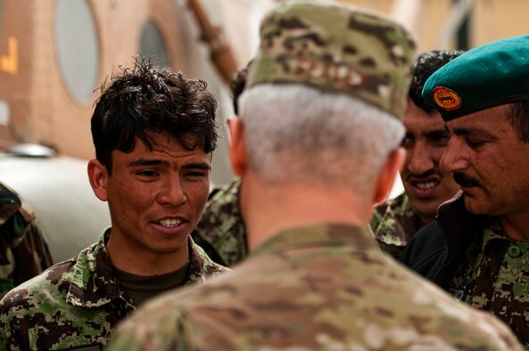 Afghan airmen from the Air Expeditionary Advisory Training Mission - Afghanistan, answer training questions from Chief Master Sgt. Robert Sealey, U.S. Air Forces Central command chief, March 15, 2012 at Kandahar Airfield, Afghanistan. (U.S. Air Force photo by Staff Sgt. David Salanitri) 


