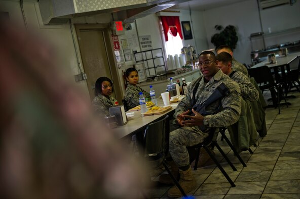 Senior Airmen Tariq Lewis, 455th Expeditionary Aircraft Maintance Squadron, asks Chief Master Sgt. Robert Sealey, U.S. Air Forces Central command chief, a question about the future of the A-10 Thunderbolt II, March 14, 2012 at Bagram Airfield, Afghanistan. During each visit, Sealey opens the floor up for questions, comments and concerns. (U.S. Air Force photo by Staff Sgt. David Salanitri) 

