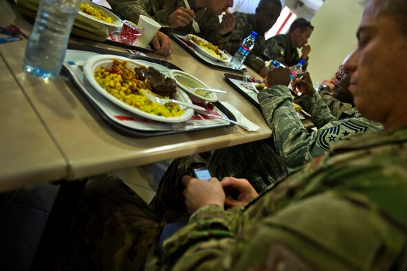 Chief Master Sgt. Robert Sealey, U.S. Air Forces Central command chief checks his e-mail for important messages at Kabul International Airport, March 13, 2012. Sealey never lets his guard down and is always on call. (U.S. Air Force photo by Staff Sgt. David Salanitri) 

