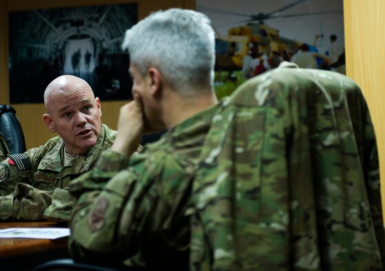 From left, Chief Master Sgt. John Hoffman, 438th Air Expeditionary Wing command chief, talks with Chief Master Sgt. Robert Sealey, U.S. Air Forces Central command chief, about the wing's operations at Kabul International Airport, March 13, 2012. (U.S. Air Force photo by Staff Sgt. David Salanitri) 


