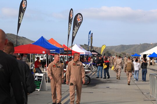 Marines of 1st Marine Division, Marine Air Group and Marine Corps Air Station Camp Pendleton visit booths and participate in the activities at Semp Ride's Fun Day on the Runway at MCASCP, May 18.