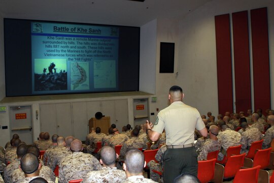 Staff Sgt. Valentin Monroy, Academics Instructor Platoon, Support Battalion, teaches Company G recruits about Marine Corps history May 11 aboard Marine Corps Depot San Diego. Recruits are tested on this knowledge while aboard the depot. To ensure they are retaining the information drill instructors go over the knowledge later, that the recruits recieved in classes.