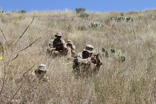 Recruits of Company D were put in four-man fire teams to test their land navigation skills at Edson Range aboard Marine Corps Base Camp Pendleton, Calif. San Diego May 15.  After a four-hour class recruits had three hours to find six boxes using only a compass, map and protractor. 