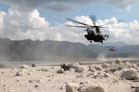 CH-53E Super Stallion helicopters from Marine Medium Helicopter Squadron-262 (REIN), 31st Marine Expeditionary Unit, prepare to land and offload Marines during a helicopter raid exercise here, Oct. 14. The training was part of the 29th iteration of the annual Philippines Bilateral Amphibious Landing Exercise, designed to increase interoperability between U.S. and Philippine forces while strengthening their long standing bond.