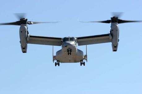 An MV-22B Osprey hovers in the sky as part of the Level III Demonstration during the 2012 Marine Corps Air Station Miramar Air Show, Oct. 13. This demonstration allowed spectators to observes the Osprey transition from helicopter to airplane mode.