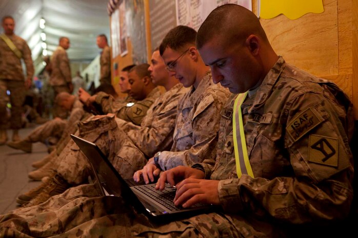 U.S. Marines and Soldiers make use of free WiFi internet provided in a morale center located on Manas Air Base, Chuy province, Kyrgyzstan, Oct. 13, 2012. Manas Air Base is a staging point for U.S. forces traveling to and from Afghanistan in support of Operation Enduring Freedom. (U.S. Marine Corps photo by Cpl. Alejandro Pena/Released)