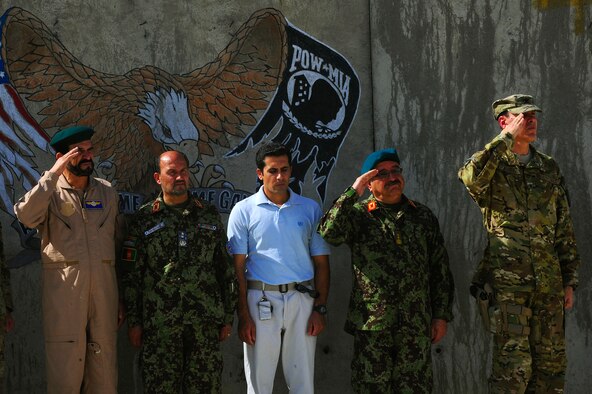 U.S. Air Force Brig. Gen. Steven Shepro, right, and Afghan Air Force Gen. Wahab salute during the playing of taps during the September 11 Memorial Ceremony, Sept. 11, 2012 at Kabul Afghanistan, International Airport Afghanistan. The ceremony was to honor those who lost their lives in the September 11 terrorist attacks and the men and women of the Department of Defense fighting the war on terrorism. (U.S. Air Force photo/Tech. Sgt. Quinton Russ/RELEASED)