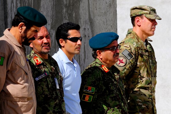 U.S. Brig. Gen. Steven Shepro, right, and Afghan Air Force Gen. Wahb listen to a narrative during the September 11 Memorial Ceremony Sept. 11, 2012 at Kabul Afghanistan, International Airport Afghanistan. The ceremony was to honor those who lost their lives in the September 11 terrorist attacks and the men and women of the Department of Defense fighting the war on terrorism. (U.S. Air Force photo/Tech. Sgt. Quinton Russ/RELEASED)