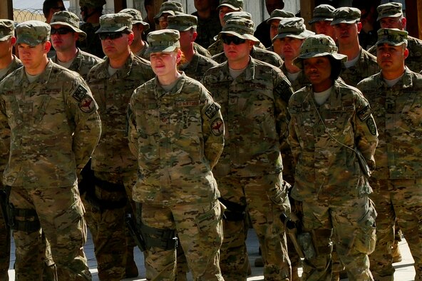 Members of the 438th Air Expeditionary Wing stand in formation during the September 11 Memorial Ceremony, Sept. 11, 2012 at Kabul Afghanistan, International Airport Afghanistan. The ceremony was to honor those who lost their lives in the September 11 terrorist attacks and the men and women of the Department of Defense fighting the war on terrorism. (U.S. Air Force photo/Tech. Sgt. Quinton Russ/RELEASED)