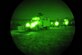 Airmen of the 755th Expeditionary Security Forces Squadron Reaper Team prepare to mount up for an early morning mission at Bagram Airfield, Afghanistan, Jan. 1, 2013. This group of security forces Airmen operates missions “outside the wire” providing security for the personnel at Bagram Airfield. (U.S. Air Force photo/Senior Airman Chris Willis)