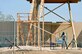 Airman 1st Class William Densford, 380th Expeditionary Security Forces Squadron, random access measures team member, plays an intruder attempting to infiltrate the installation during a demonstration of the Tactical Automated Security System (TASS) at an undisclosed location in Southwest Asia Mar. 20, 2013. TASS is a collection of equipment, using different technologies, designed to secure multiple perimeters. (U.S. Air Force photo by Tech. Sgt. Christina M. Styer) 
