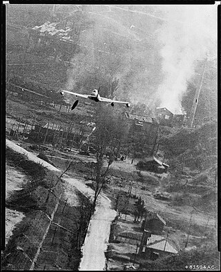 An Air Force F-80 Shooting Star fighter-bomber involved in an air strike over Suan, North Korea, in the largest air strike of the Korean Conflict on May 8, 1952 (Courtesy of the National Archives and Records Administration)
