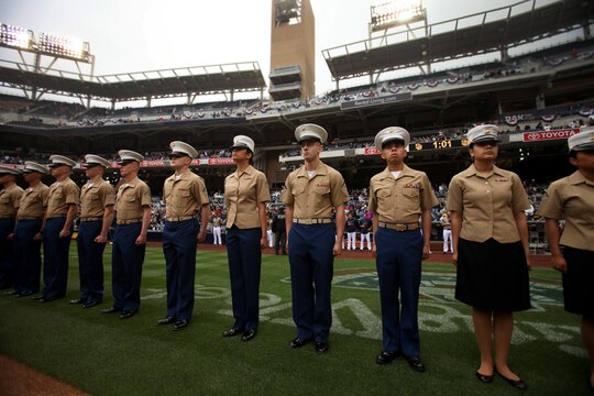 Marines with 1st Marine Logistics Group and other military units throughout California stand at attention during a San Diego Padres Military Appreciation Day event at Petco Park, April 14, 2013. The Major League Baseball team hosts these events regularly to show their appreciation for the large military influence present in California. (U.S. Marine Corps photo by Cpl. Laura Gauna/Released)