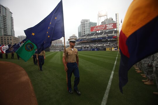 Marines throughout California march off the field during a San Diego Padres Military Appreciation Day event at Petco Park, April 14, 2013. The Major League Baseball team hosts these events regularly to show their appreciation for the large military influence present in California.
