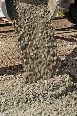 U.S. Air Force Airmen assigned to the 380th Expeditionary Civil Engineer Squadron known as "Dirt Boyz" pour concrete pads at an undisclosed location in Southwest Asia April 16, 2013. The "Dirt Boyz" have laid 96 concrete pads to aid in the transition from expeditionary to enduring.  (U.S. Air Force photo by Tech. Sgt. Christina M. Styer)