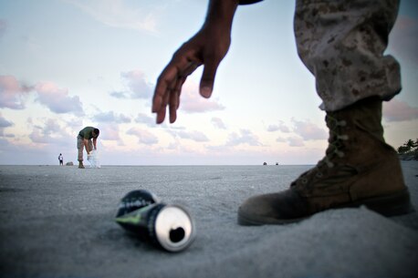 Marines with Recruiting Station Fort Lauderdale clear south Florida beaches of hazardous debris April 24, 2013 as part of a partnership with Palm Beach County Parks and Recreation. Beginning this May, Marines with Recruiting Substations West Palm Beach and Delray Beach will be a prominent sight as they clear and clean area beaches of trash and debris washed ashore by tides or left behind by beach goers.  
