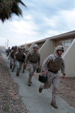 MARINE CORPS BASE CAMP PENDLETON, Calif. – Sergeant Art Shvartsberg, combat videographer, Headquarters and Service Company, Headquarters Battalion, 1st Marine Division, leads his Marines on a run at Camp Margarita here, July 26, 2012. Shvartsberg, a native of Brooklyn, N.Y., is a martial arts instructor trainer and incorporates additional training from the Marine Corps Martial Arts Program into his combat conditioning program.
(U.S. Marine Corps photo by Sgt. Jacob H. Harrer)