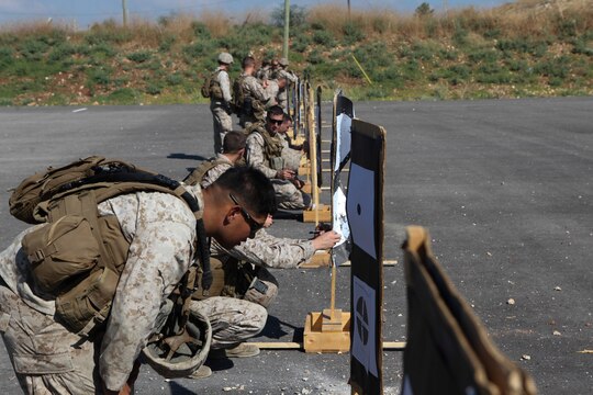 U.S. Marines and sailors with Black Sea Rotational Force 13 observe where rounds impacted targets during a battle sight zero exercise while training with the Israel Defense Force Counter-Terrorism Unit aboard Camp Adam, Israel, July 5, 2013. The purpose of the BZO course of fire is to ensure the respective Marines' rifle is properly sighted for future live fire exercises. (U.S. Marine Corps photo by Staff Sgt. David Rakes, Sr./released)