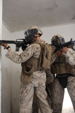 U.S. Marines with Company E, Black Sea Rotational Force 13, clear a room using simulation rounds during close quarters battle drills during Exercise Noble Shirley 13 aboard Camp Adam, Israel, July 10, 2013. The purpose of Noble Shirley 13 is to improve interoperability, understanding and cooperation between the IDF and U.S. Marines.  (U.S. Marine Corps photo by Staff Sgt. David Rakes, Sr./released)