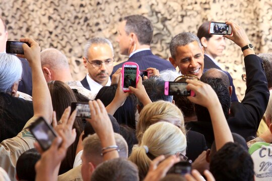Commander in Chief, Barack Obama, greets service members and their families in the audience after his speech at the Marine Corps Air Station Camp Pendleton Aug.7. Obama spoke about the war in Afghanistan, the Wounded Warrior Program and his appreciation for the armed services.