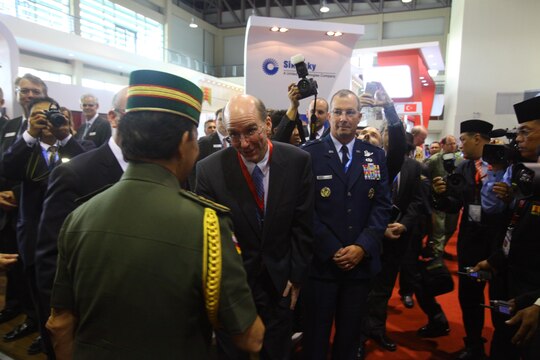 U.S. Ambassador to Brunei Daniel L. Shields greets the Sultan of Brunei Haji Hassanal Bolkiah Mu’izzaddin Waddaulah Dec. 3 at the BRIDEX Exhibition Center in Bandar Seri Begawan, Brunei, during the 4th Biennial Brunei Darussalam International Defense Exhibition and Conference. The five-day event includes displays and demonstrations of military equipment, with the theme of bridging the capability gap. BRIDEX 13 is an opportunity for communication and cooperation with regional partners and allies, builds strong multilateral relationships and enhances preparedness for disasters and other contingency operations. U.S. participation in BRIDEX 13 demonstrates cooperative engagement with Brunei and continued commitment to regional security and stability in the Asia-Pacific region. McGillicuddy is chief of staff, Pacific Air Force.