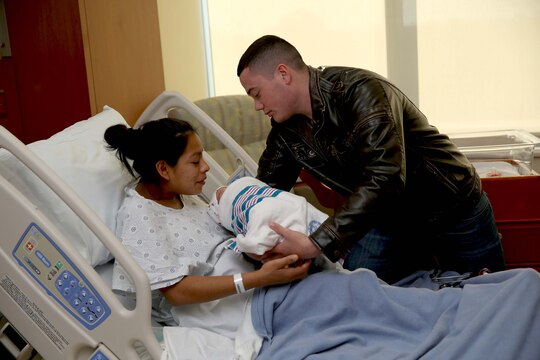 Pfc. Nicholas M. Cabral and wife, Lance Cpl. Lucia Y. Cabral, take turns holding their newborn baby at Camp Pendleton’s newest hospital. The Naval Hospital Camp Pendleton facility, built in 1969, was officially decommissioned, requiring patients to be relocated to Pendleton’s recently built, 500,000-square foot, replacement hospital Dec. 14. The four-floor building cost $456 million and took more than three years to construct. Lucia is a maintenance management specialist and Nicholas is a warehouse clerk with1st Marine Logistics Group.