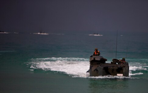 Royal Thai Marines float ashore in amphibious assault vehicles during an amphibious assault rehearsal for Cobra Gold 2013 here, Feb. 13. The amphibious assault combined the capabilities of Company A, Battalion Landing Team 1st Battalion, 5th Marine Regiment, 31st Marine Expeditionary Unit, and Royal Thai Marines in a bilateral attack. Exercise Cobra Gold is an annual event that includes numerous multilateral exercises ranging from amphibious assaults to non-combatant evacuations. The training aims to improve interoperability between the United States, Kingdom of Thailand, and many other participating countries. The 31st MEU is the only continuously forward-deployed MEU and is the Marine Corps’ force in readiness in the Asia-Pacific region.