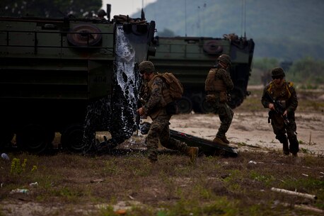 Marines with Battalion Landing Team 1st Battalion, 5th Marine Regiment, 31st Marine Expeditionary Unit, exit an amphibious assault vehicle during an amphibious assault rehearsal for exercise Cobra Gold 2013, Feb. 13. The amphibious assault combined the capabilities of Company A, Battalion Landing Team 1st Battalion, 5th Marine Regiment, 31st Marine Expeditionary Unit, and Royal Thai Marines in a bilateral attack. Exercise Cobra Gold is an annual event that includes numerous multilateral exercises ranging from amphibious assaults to non-combatant evacuations. The training aims to improve interoperability between the United States, Kingdom of Thailand, and many other participating countries. The 31st MEU is the only continuously forward-deployed MEU and is the Marine Corps’ force in readiness in the Asia-Pacific region.